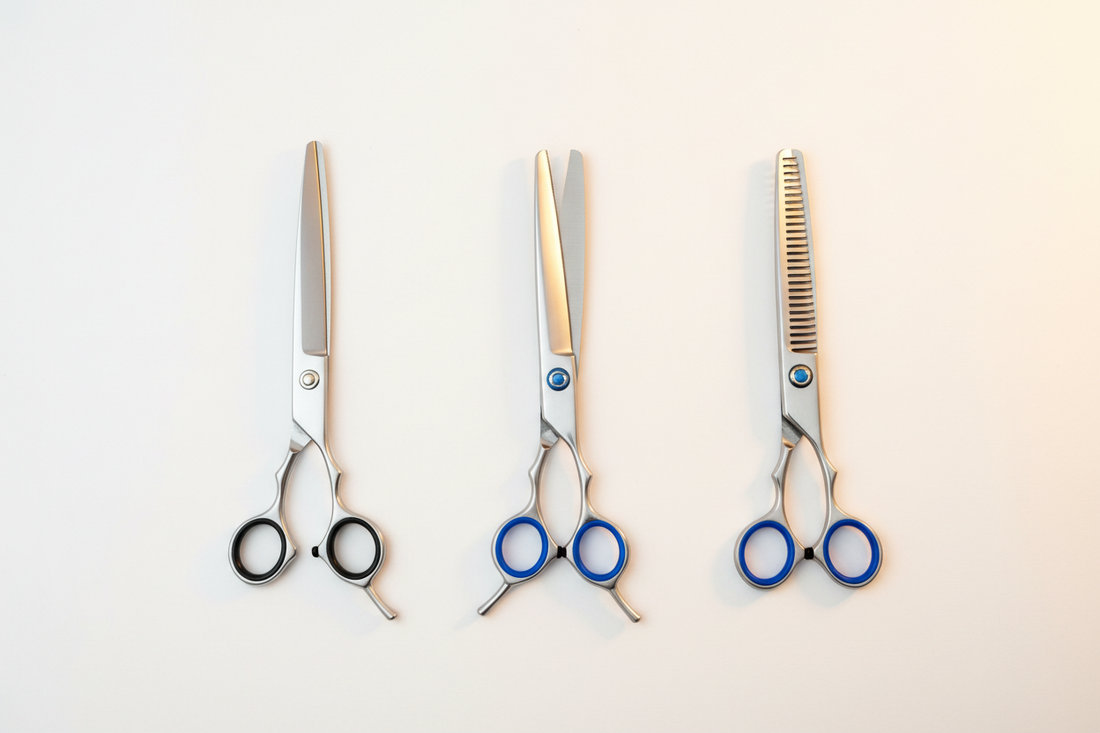 Straight shears, thinning shears, and chunker shears arranged side by side — pet grooming scissors comparison